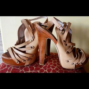 Sexy beige leather and wood healed sandals.
